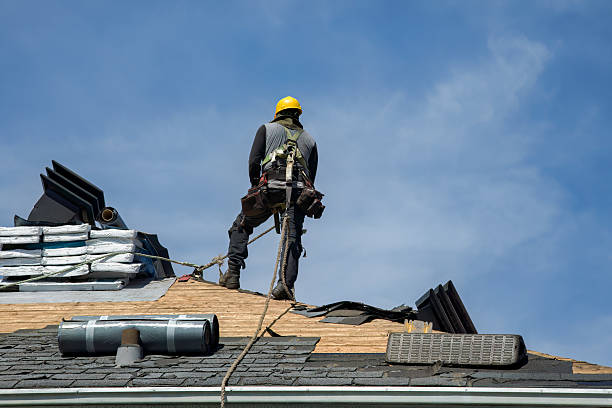 Professional Storm Damage Roof Repair technician working in Homer City, PA